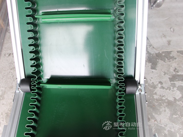 裙邊擋板爬坡輸送機